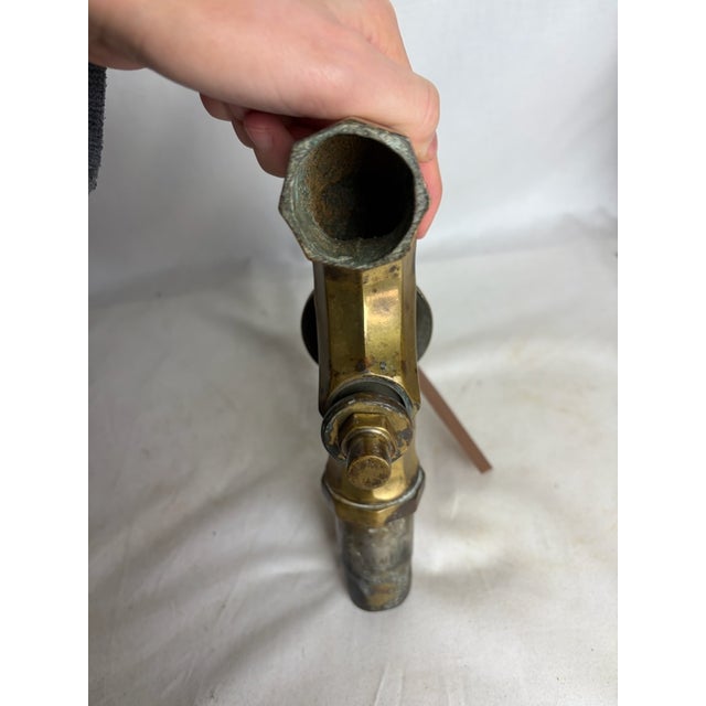 This antique bronze fountain spigot is fascinating to look at. By touching and looking at it you can get a feel for how it...