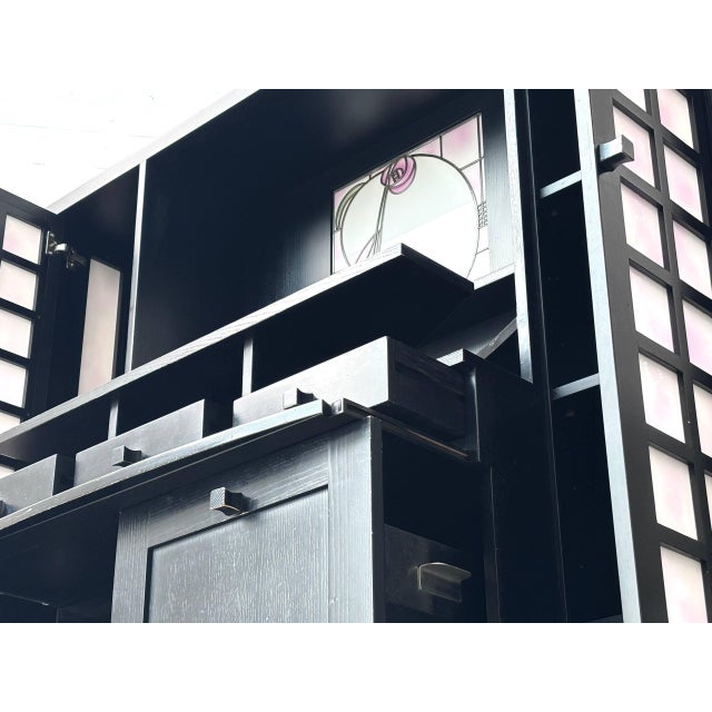 This exceptional sideboard by charles rennie mackintosh comes from the bern casino. It combines the clean geometry of...