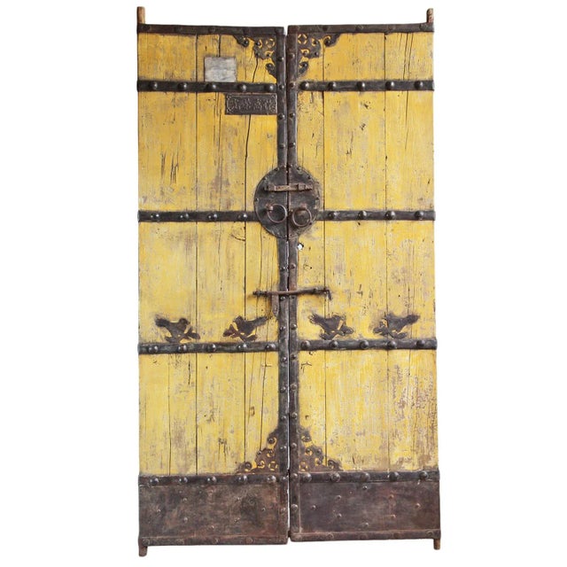 Old elm wood Chinese entry / garden gate. Beautiful faded yellow patina with original iron work design details. Height...