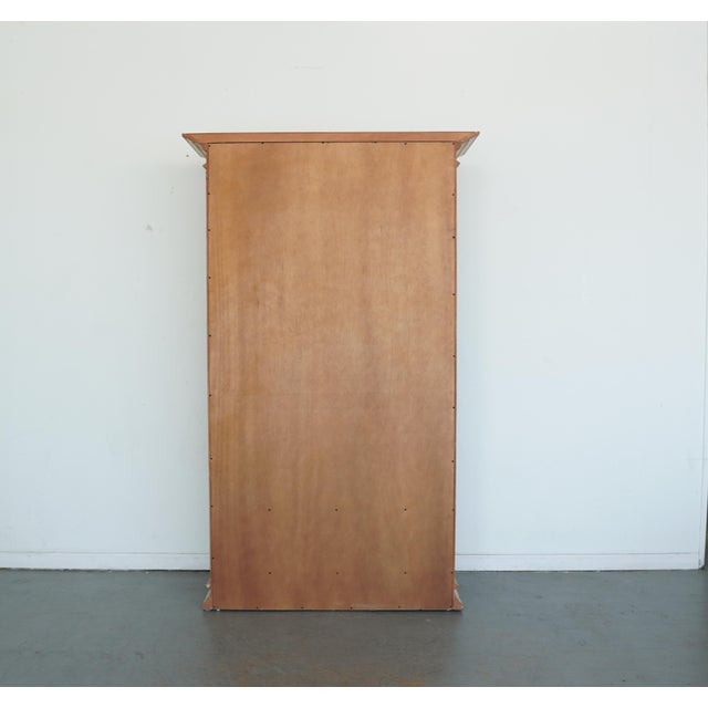 This elegant vintage bookcase beautifully captures the warmth and charm of French-inspired design. Finished in a soft,...