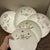 This is a five-piece ceramic dinnerware set decorated with a beautiful floral pattern. These plates are a wonderful choice...