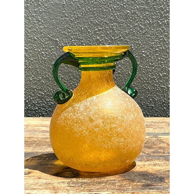 This exquisite vintage Italian art glass vase is a testament to the master craftsmanship of the Venetian glassblowing...