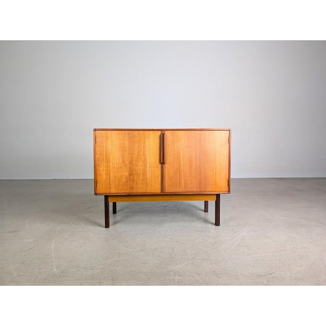We are offering a beautiful vintage sideboard/credenza by Asko Finland from the 1960s for sale. The piece offers generous...