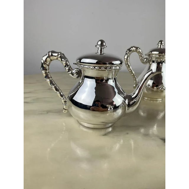 4 pieces set tea and 800 silver caffe Made in Italy, 80s. Never used. Like New. Overall weight kg. 1.00. The teapot is...