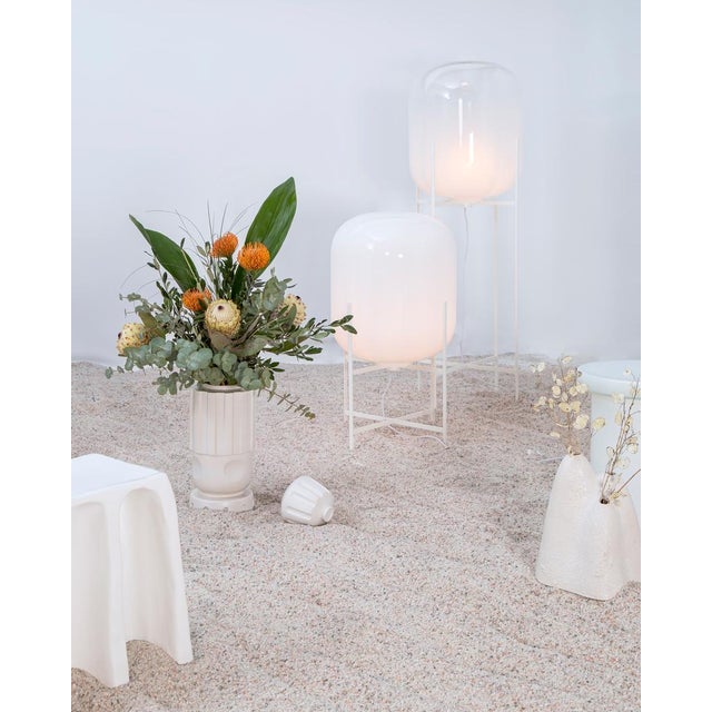 Oda in Between Moonlight White Floor Light from Pulpo, in New conditions. Designed from 2000 Labeled by Maker, European...