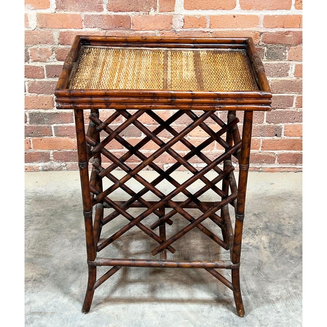 A beautiful vintage bamboo and rattan wine rack with a removable woven rattan top, perfect for use as a bar cart, side...