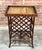 A beautiful vintage bamboo and rattan wine rack with a removable woven rattan top, perfect for use as a bar cart, side...