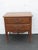 This Nightstand / End / Side Table is made out of wood and solid wood. It has a French style and design, with distressed...