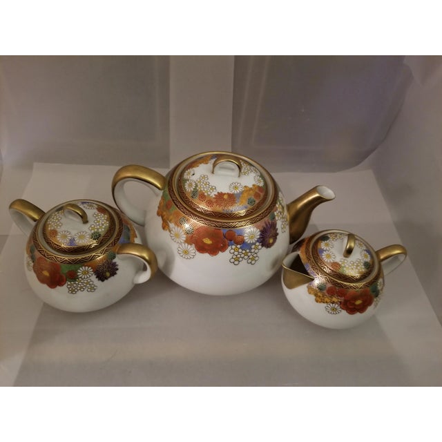 Beautiful, heavily gilded with gold Vintage Japanese Koshida Handpainted Tea Set. Five pieces included. Teapot, Creamer,...