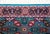 A late 20th century Persian Tabriz rug with the most wonderful mirrored stylized floral pattern woven in brilliant pinks,...