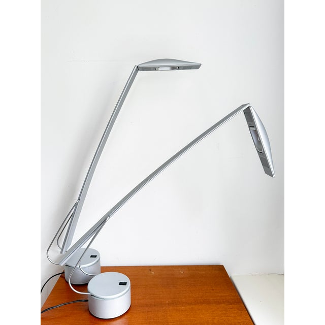 A desk lamp model dove by italiana luce, designed in 1984 by mario barbaglia and marco colombo, made in italy. a refined...