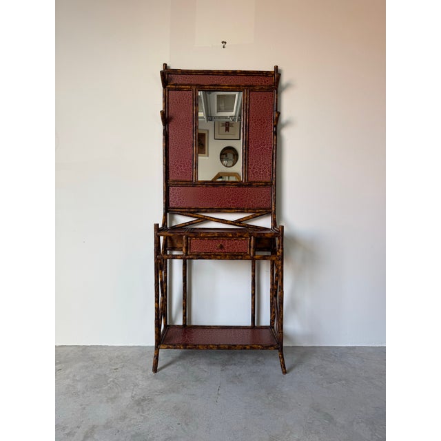 Elegant and highly decorative vintage hall tree attributed to Maitland-Smith, crafted in the classic English chinoiserie...