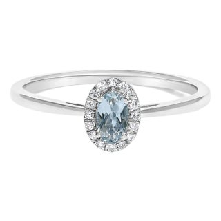 10K White Gold 5X3MM Oval Blue Aquamarine and Diamond Accent Halo Ring (I-J Color, I1-I2 Clarity) - Ring Size 7.5 For Sale