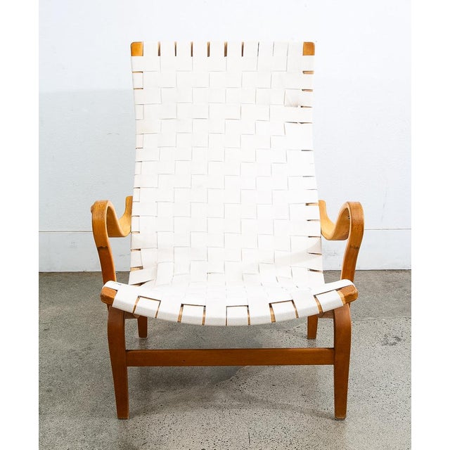 Iconic "Pernilla" armchair / Lounge chair designed by Bruno Mathsson. The first version was designed in 1944. This is an...