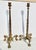 French Empire or Neoclassical style candlesticks. zFinely formed with panther heads and reeded stems. Palmettes rise, with...