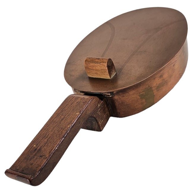 This vintage Revere Copper silent butler reflects mid-century American dining service, designed for clearing crumbs...