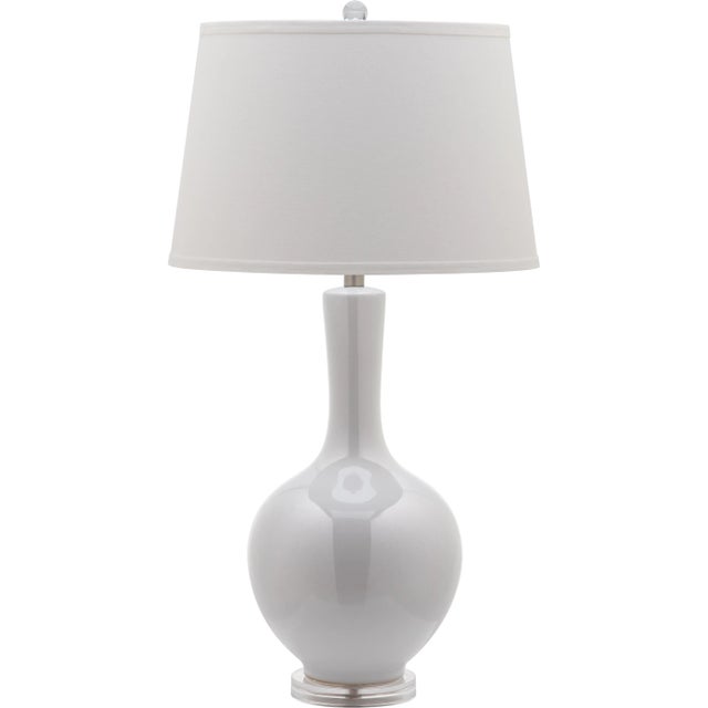 Graceful and curvaceous, the Blanche gourd lamp is sure to illuminate any room with elegance and style. it's classic body...