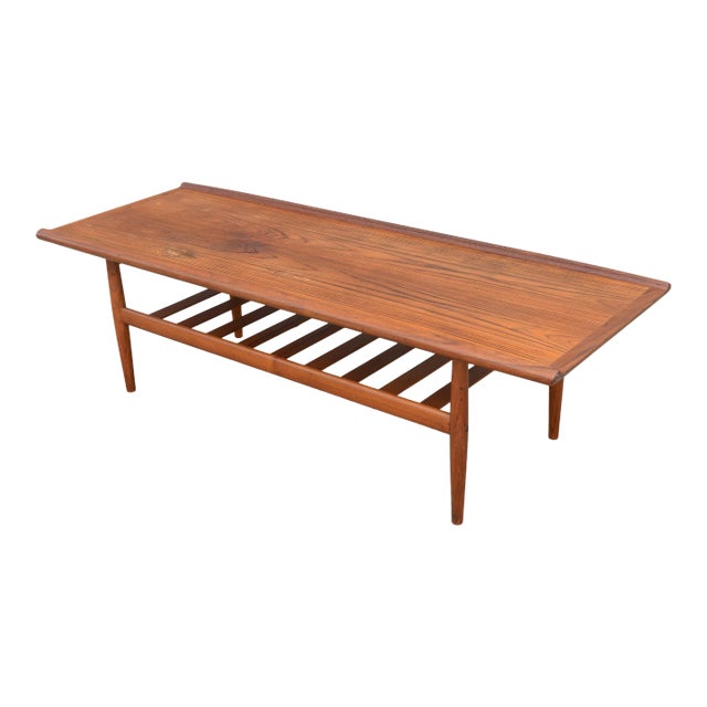 Mid Century Danish Sculpted Teak Coffee Table With Slatted Shelf For Sale