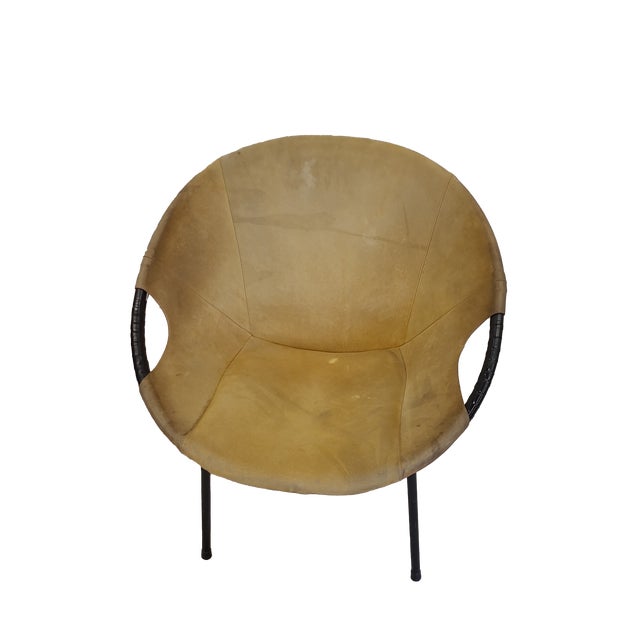 These are the beautiful "Balloon" chairs, with suede fabric and leather arms.