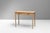 Two drawer pine side table on square tapered legs. Circa 1820.
