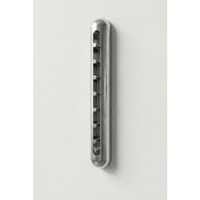 00 xl wall sconce by pietro franceschini materials: cast aluminium or cast bronze dimensions: w 10 x d 15 x h 100 cm all...