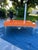2020s Mid-Century Modern Style High-Gloss Orange Lacquered Wood and Lucite Greek Key Coffee Table by Julio Jimenez For Sale - Image 5 of 17