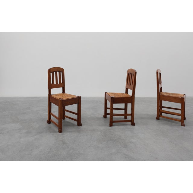 Belgium / 1915 / 4 dinner chairs / oak and wicker / Art Nouveau / Art Deco This elegant set of four Belgian dining chairs,...