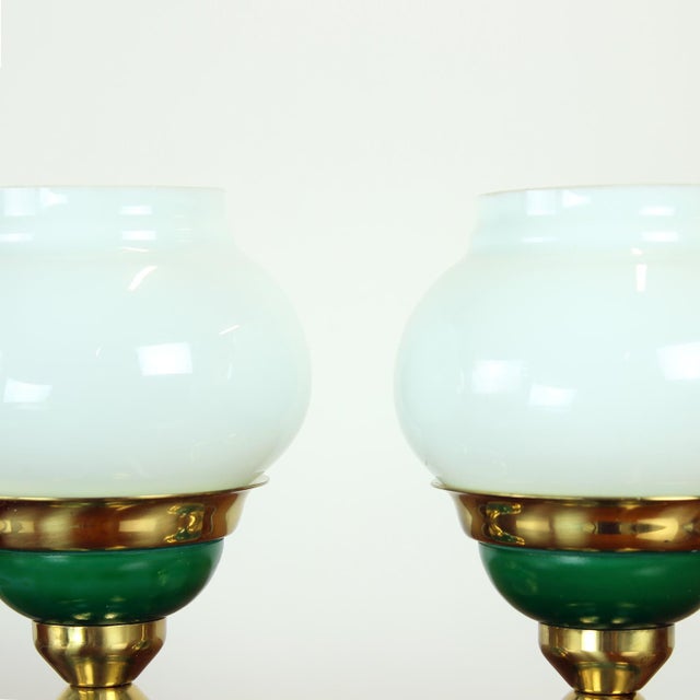 A beautiful pair of mid-century table lamps produced in 1955 by Jablonecké Sklárne, Czechoslovakia. Each lamp combines...