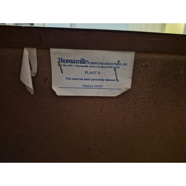 Add a touch of rustic elegance to your space with this charmingly refinished Thomasville small dresser, expertly...