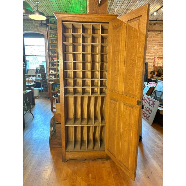 This classic exterior reveals a uniquely divided filing cabinet found in a railroad office, featuring 40 cubbies and 12...