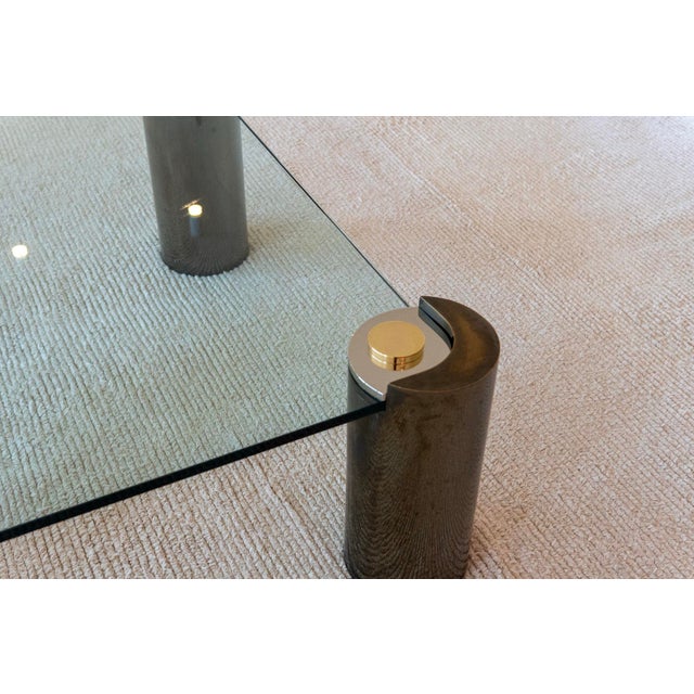 Elevate your interior with this rare and monumental-sized Karl Springer “Sculpture” coffee table, a stunning example of...