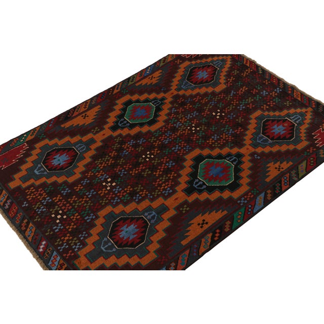 Hand knotted in wool, this 6x8 Baluch rug represents a new line of tribal carpets in the Modern Classics Collection by Rug...