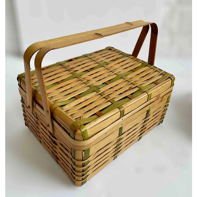 Set of three vintage reed and bamboo lightweight picnic baskets with handles. Three sizes:Small:W:10" x D:7.3" x H:4.75",...