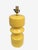 A 1980's bright yellow glazed ceramic table lamp with a shapely hooped design. The finial and shade are not included in...