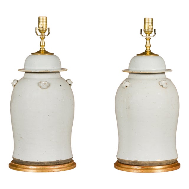 Asian Modern White Porcelain Lidded Urns on Gilded Bases - Pair For Sale