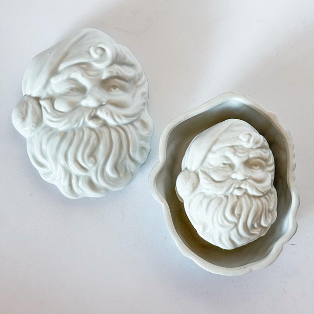 The sweetest vintage porcelain nesting Santa boxes. These would be so sweet on a coffee table or island to stash Christmas...