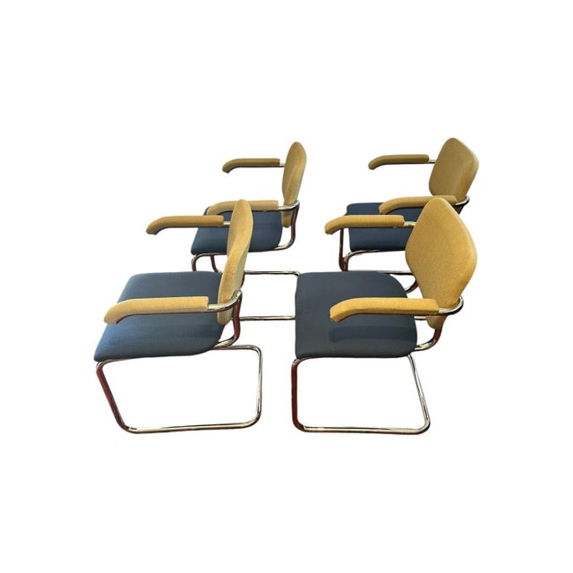 Marcel Breuer for Knoll Cesca Dining Arm Chairs Originally designed by Marcel Breuer in 1928 These examples were...