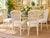 Set of Four Henry Link–Style Faux-Bamboo Dining Chairs by Chaircraft Ivory-painted dining chairs featuring tall woven cane...