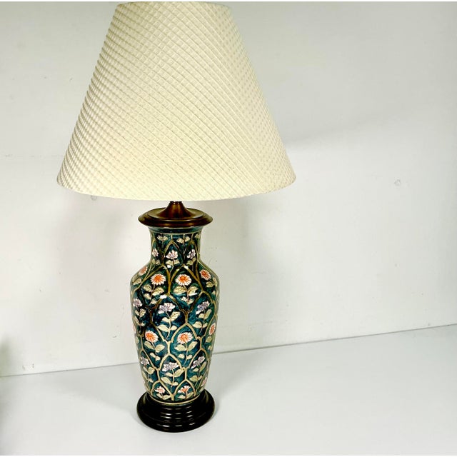 This is a lovely ceramic Chinoiserie hand painted ceramic Table Lamp from the Mid-Century. It features a gorgeous ginger...
