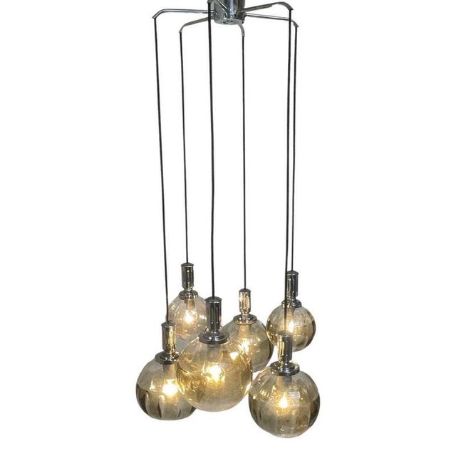 Vintage ceiling mounted / hanging fixture or chandelier. Cascade model with 6 glass orbs, of which four are large with an...
