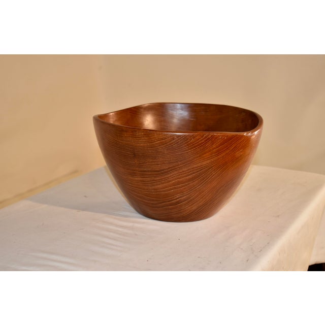 Mid-century hand turned Teak bowl from Europe, circa 1960's. This bowl has a lovely form and gorgeous figuring in the wood...