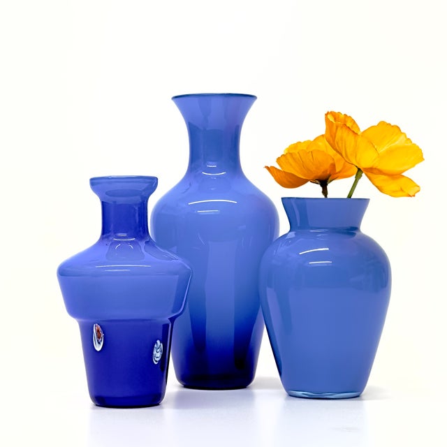 Cornflower blue glass vases, group of 3. A gorgeous group of deep cornflower blue-cased glass vases from the 20th century...