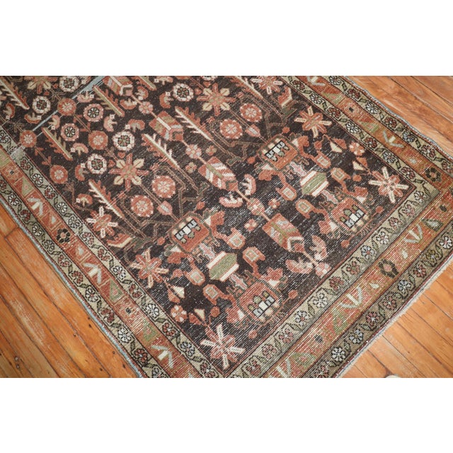 An early 20th Century Persian Malayer wide and long runner in predominantly brown