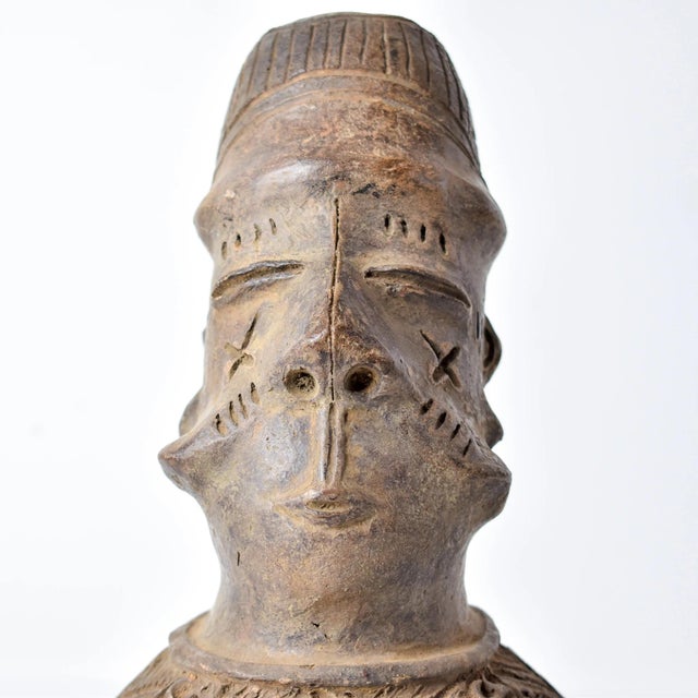 This Mangbetu Burial Vessel is handcrafted by skilled artisans. This pot is a true representation of Congo's traditional...