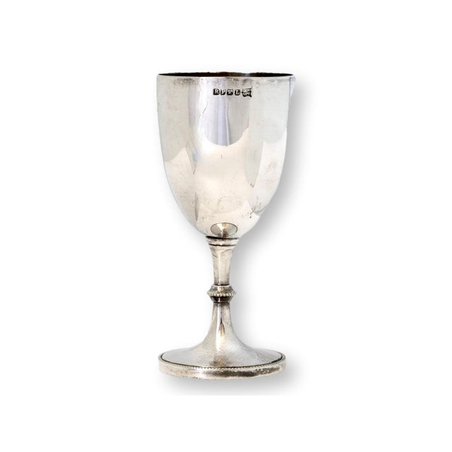 English silverplate trophy cup engraved 'Wanstead Swimming Club, C. Ramsey, 1/2 Mile Champion, 1933.' Sporting trophies...
