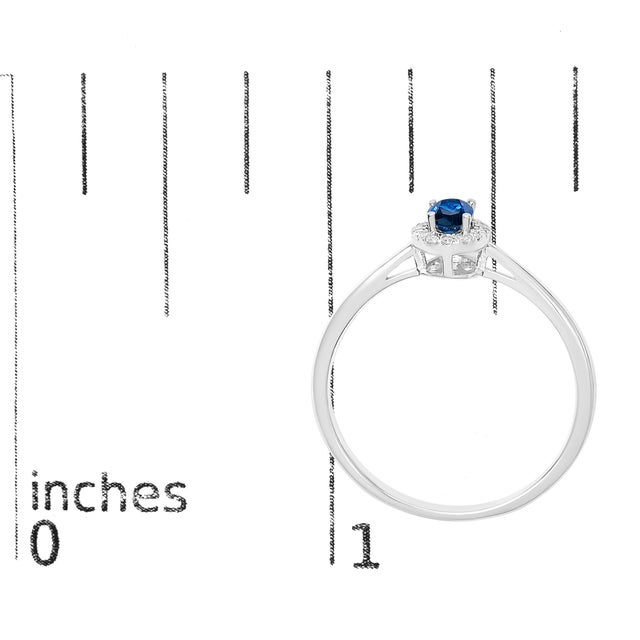 Metal 10K White Gold 5X3MM Oval Blue Sapphire and Diamond Accent Halo Ring (I-J Color, I1-I2 Clarity) - Ring Size 7.5 For Sale - Image 7 of 7