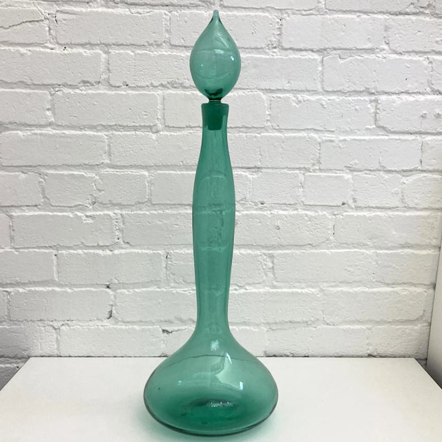 Blenko Sea Green Tall Decanter, Wayne Husted Decanter measures 26" by 9" and is signed with the acid etched Blenko...