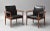 This is a Finn Juhl diplomat desk chair or armchair with frame in solid hardwood. It is the model 209. It was designed in...