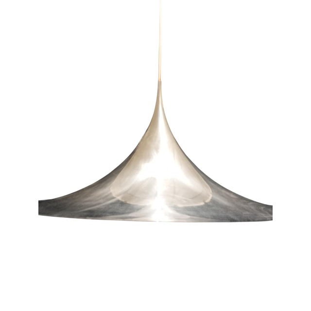 The Semi Pendant Lamp is an iconic pendant lamp designed by Claus Bonderup and Torsten Thorup for the renowned Danish...