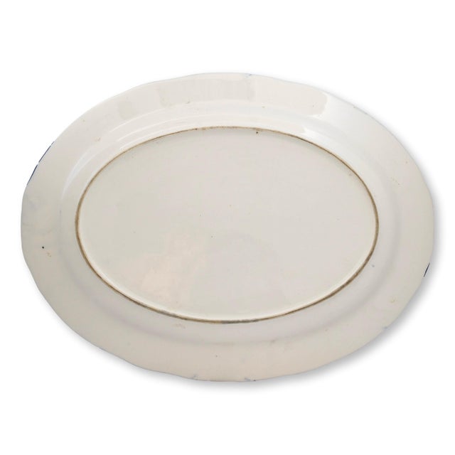 This beautiful English transferware turkey platter features a detailed pastoral scene of a turkey, enhanced with hand-...